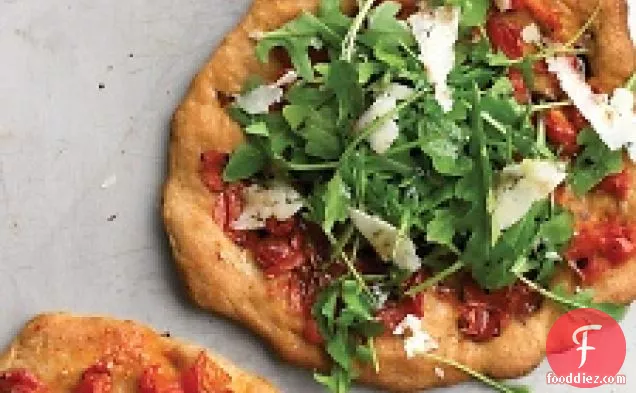 Individual Pizza With Arugula And Tomatoes