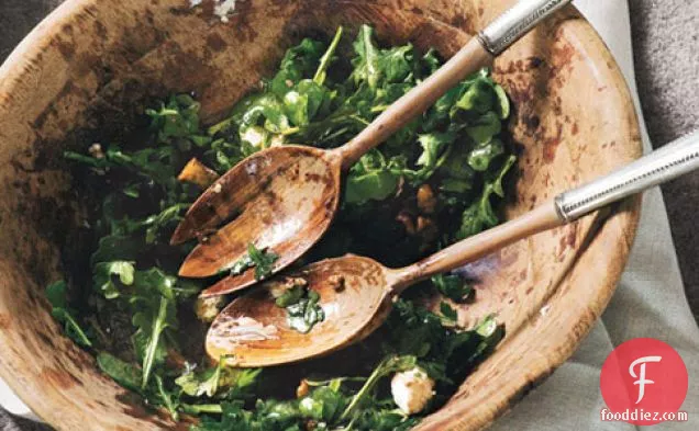 Arugula Salad With Caramelized Onions, Goat Cheese, And Candied