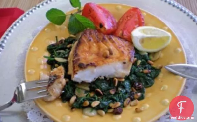 Sea Bass on Spinach With Raisins and Pine Nuts