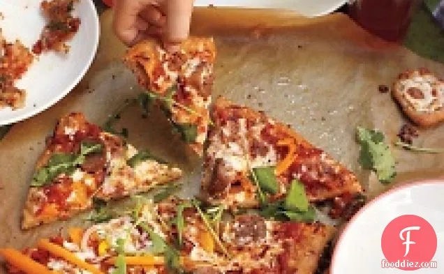 Pizza With Turkey Sausage, Orange Peppers, And Arugula