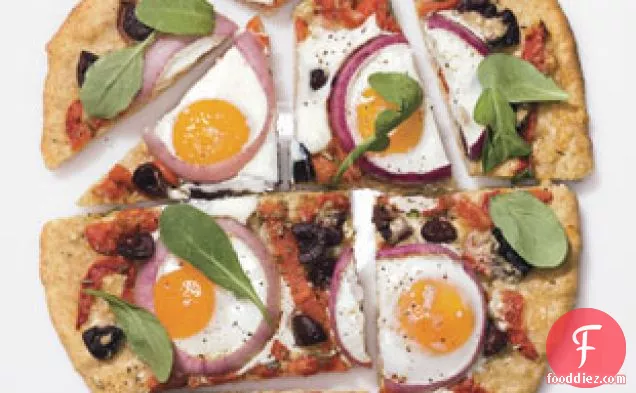Pizza With Eggs, Roasted Red Peppers, Olives, And Arugula