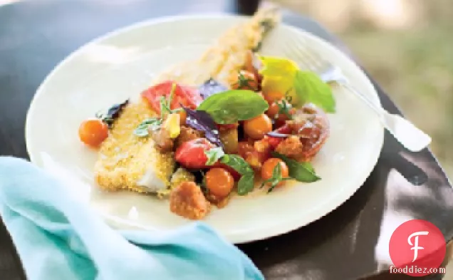 कॉर्नमील-टमाटर, सॉरेल और तुलसी पैनज़ेनेला के साथ तला हुआ ट्राउट