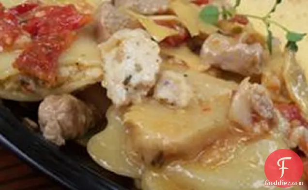 टूना, धूप में सुखाए गए टमाटर, आटिचोक दिल, नींबू और सफेद शराब के साथ पास्ता