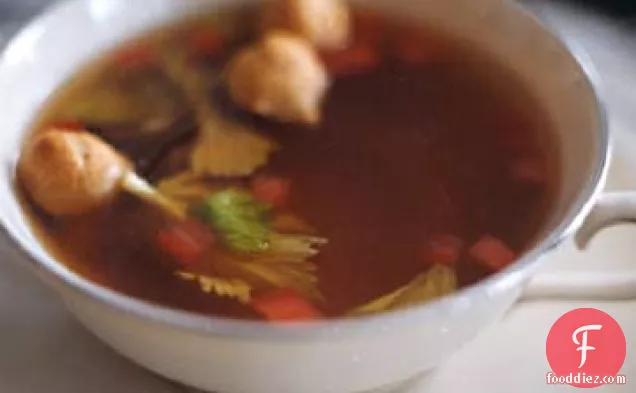 Tomato and Celery-Infused Beef Consommé with Tiny Choux Puffs