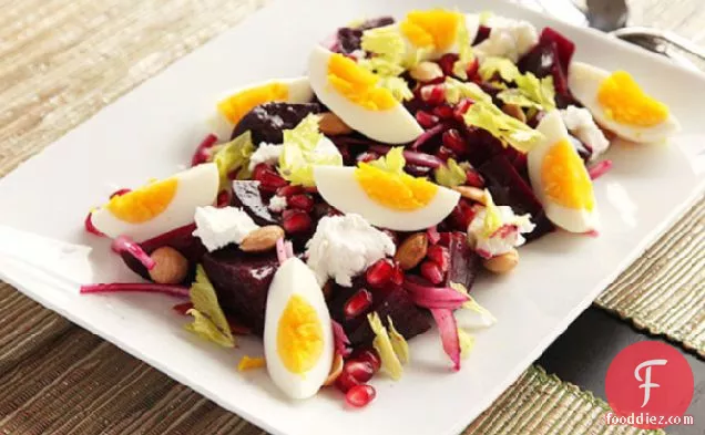 Roasted Beet Salad with Goat Cheese, Eggs, Pomegranate, and Marcona Almond Vinaigrette