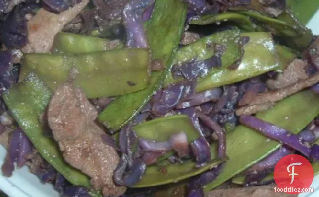 मशरूम और बर्फ मटर के साथ अदरक पोर्क