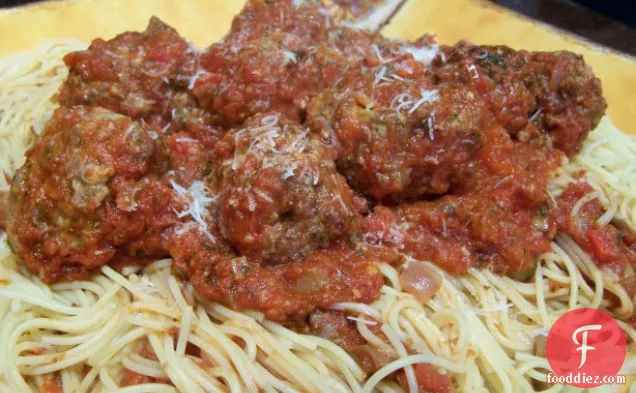 That's a Spicy Meatball Parmesan over Spaghetti